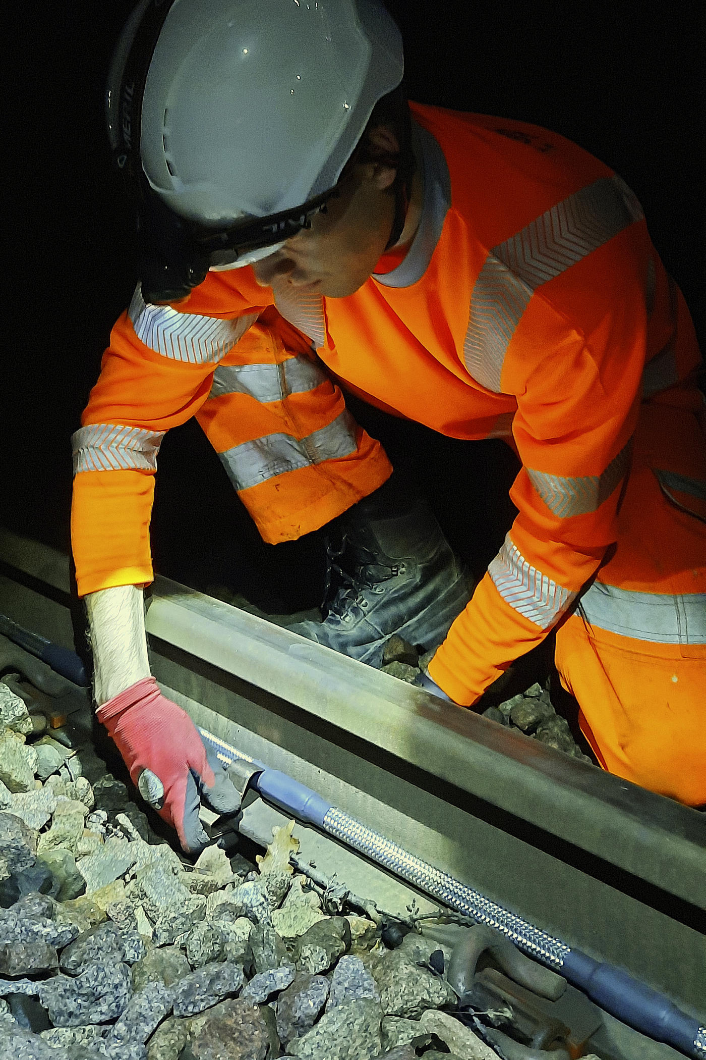 Engineer installing ShapeArray on track